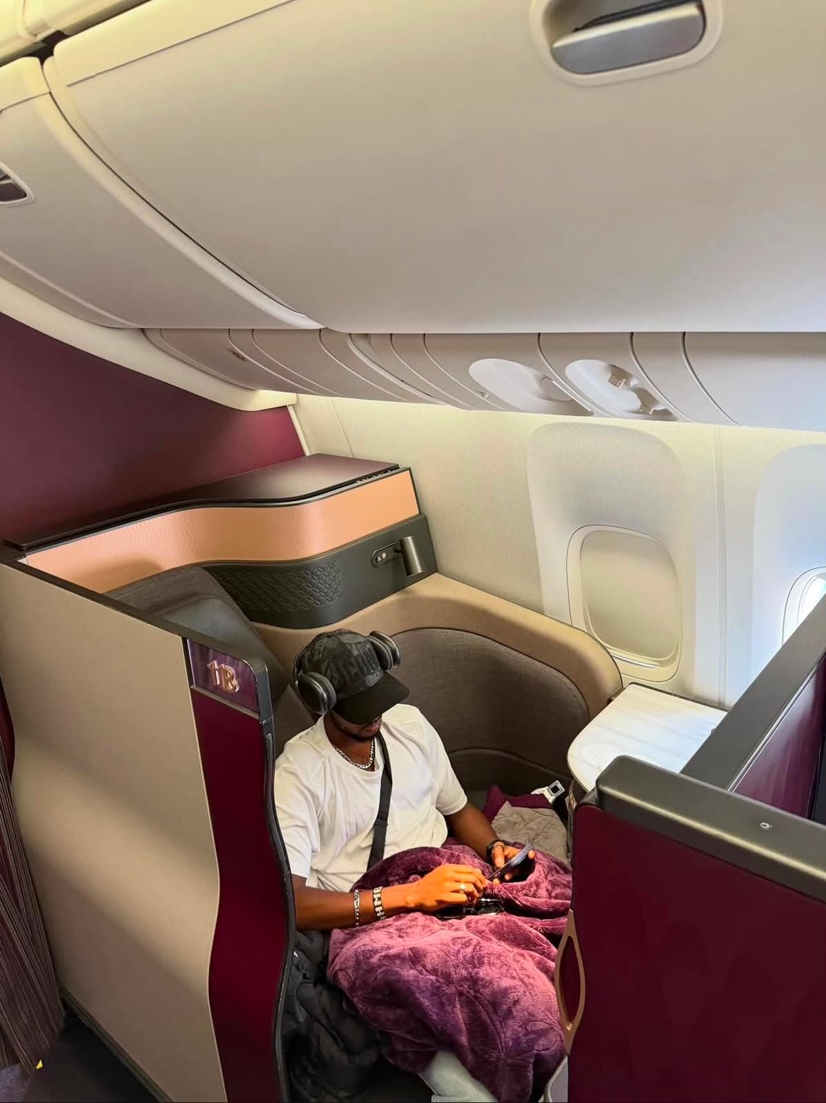 Ahmed in a business class cabin